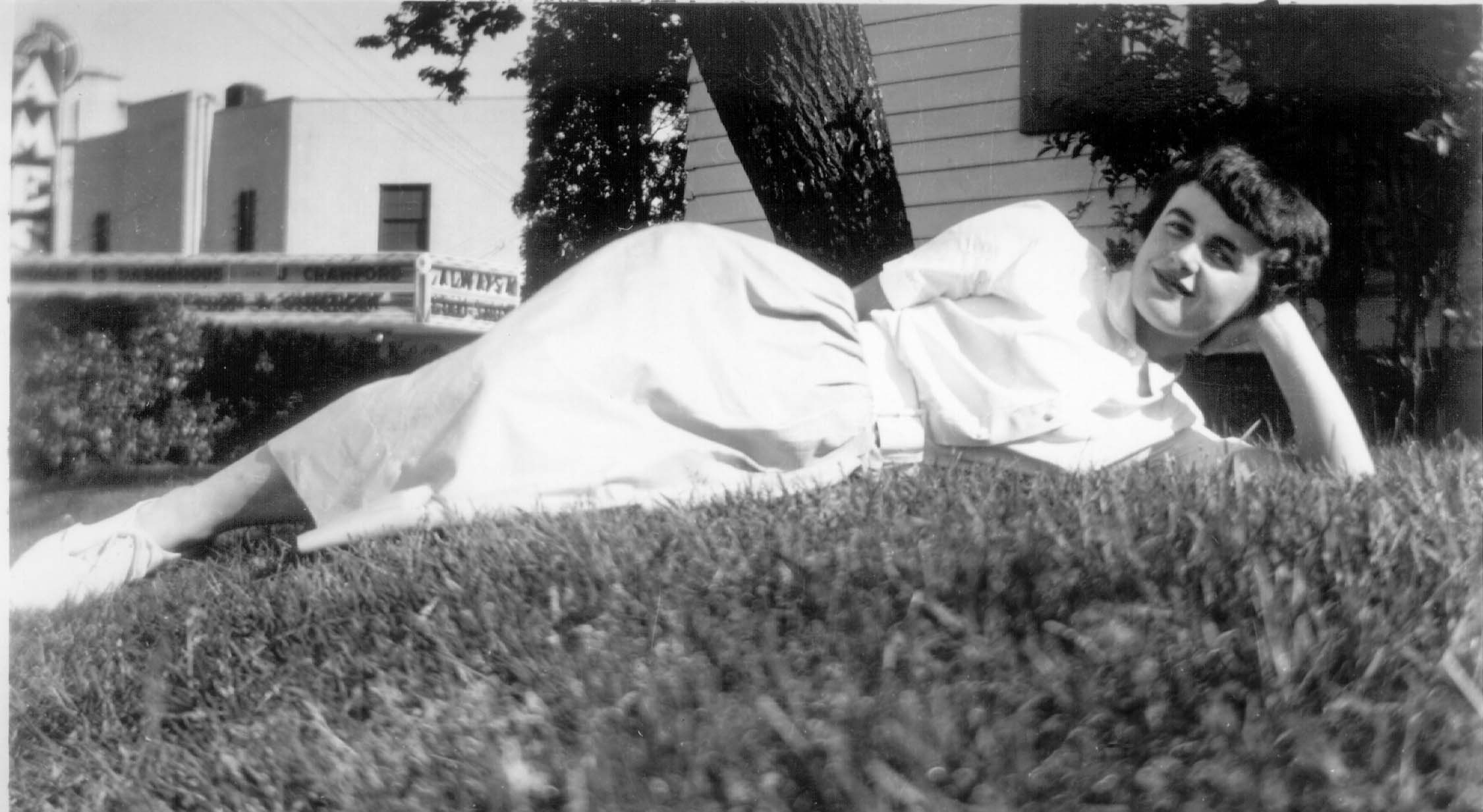 Photo of mom laying on the grass