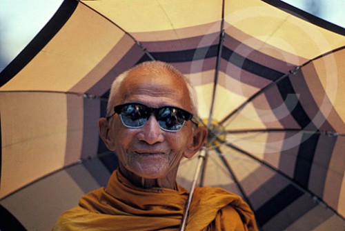 Photo of a monk wearing Ray Bans