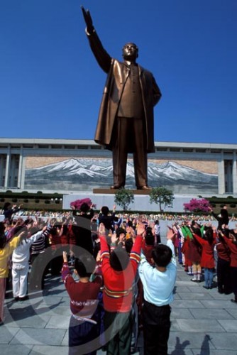 Photo of children saluting Kim Il Sung Statue in Pyongyang, North Korea